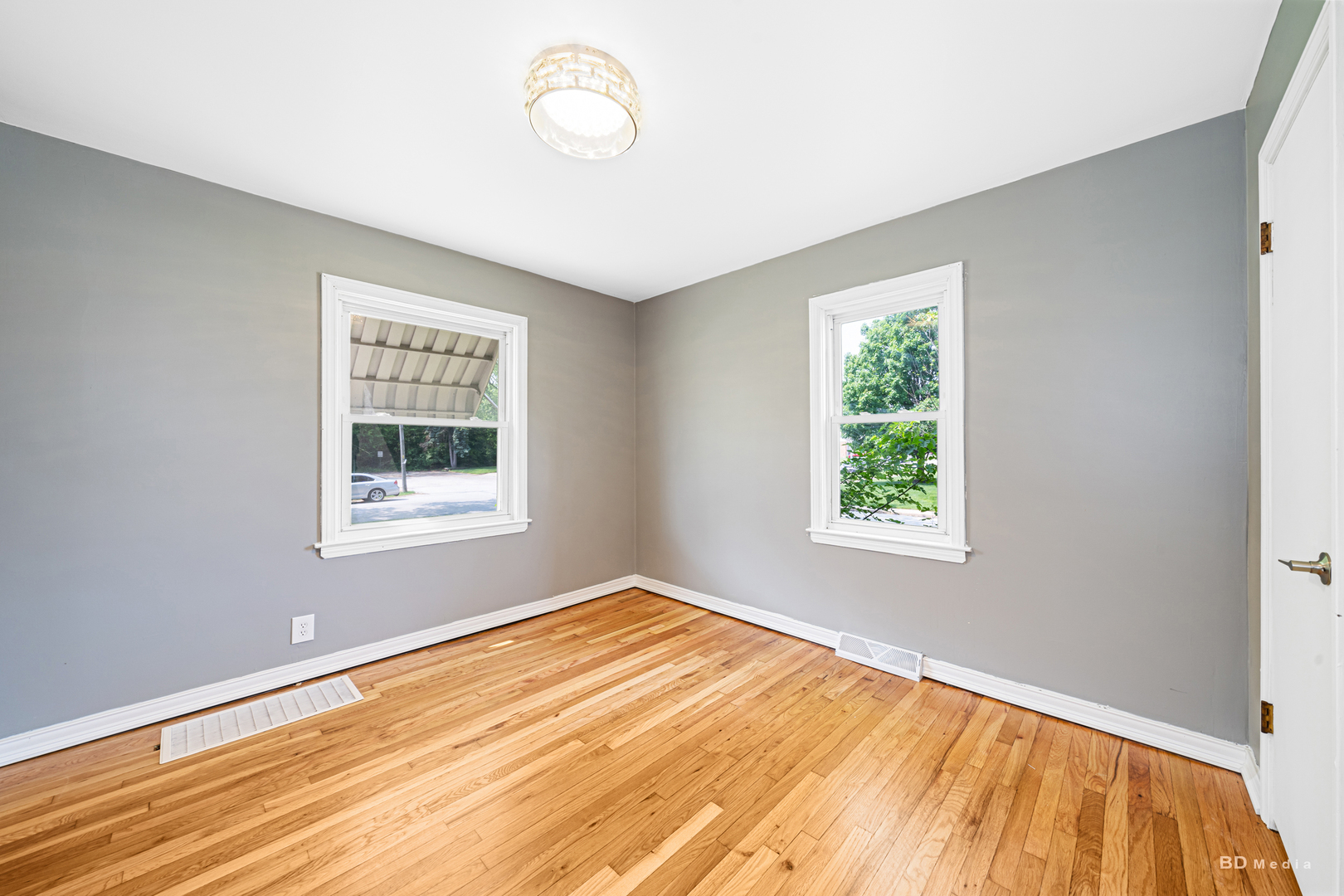 446 Warren Street Calumet City, IL 60409 - Photo 9 of 20 a view of an empty room with a window