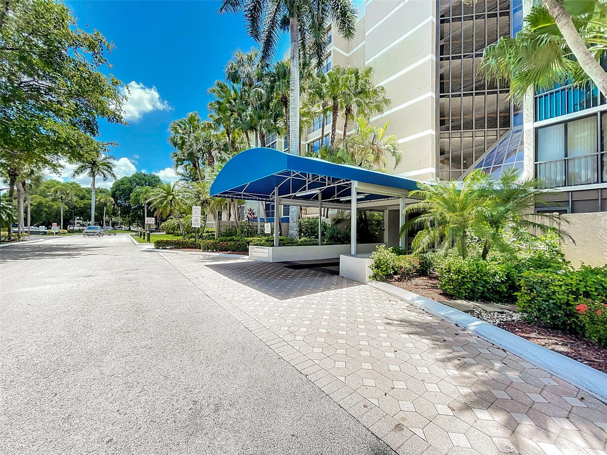 16300 Golf Club Road, Unit 809 Weston, FL 33326 - Photo 34 of 42 New blue awning at entrance