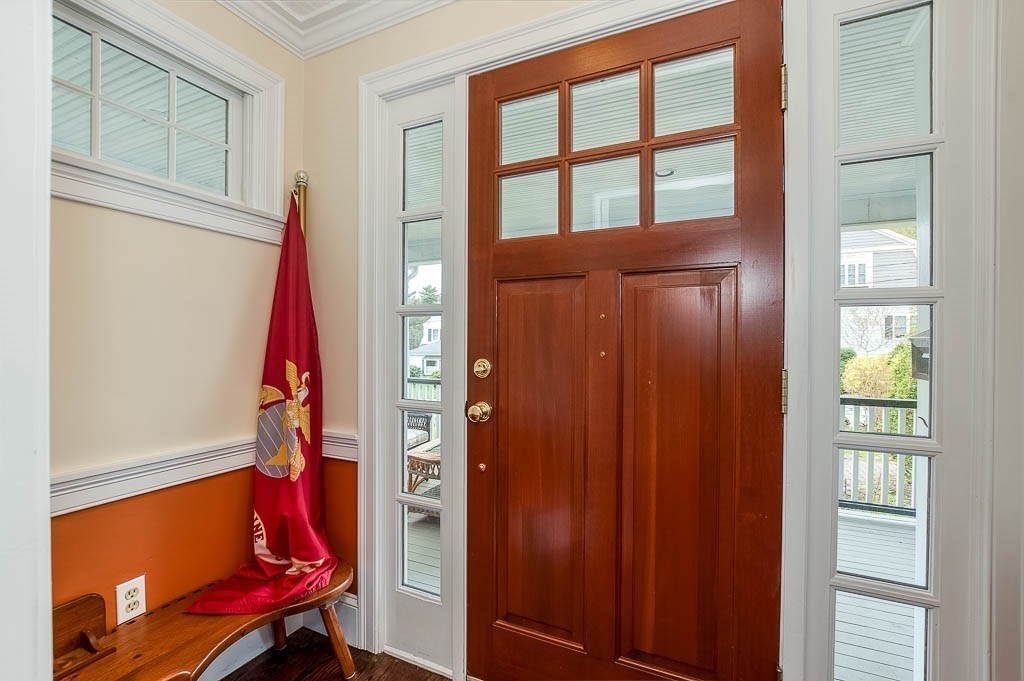64 Prospect Street Needham, MA 02492 - Photo 7 of 34 a view of an entryway with hardwood