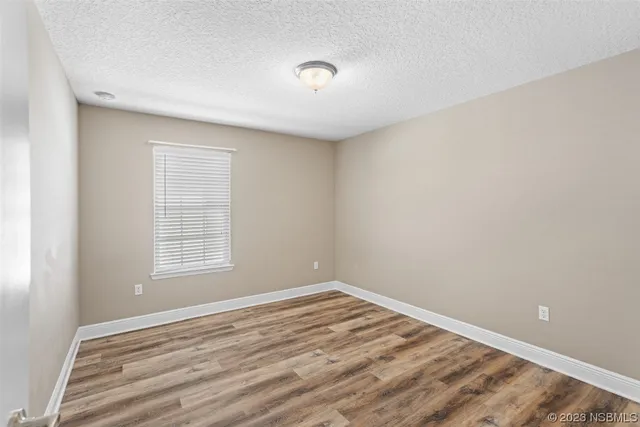 a view of a hallway with closet