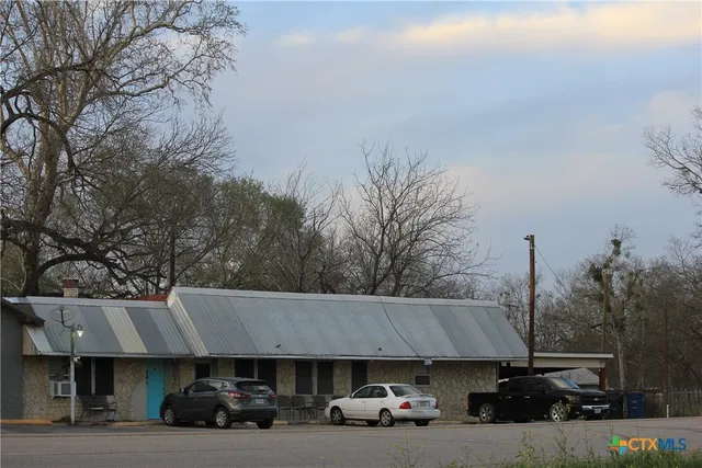 a car parked in front of a house