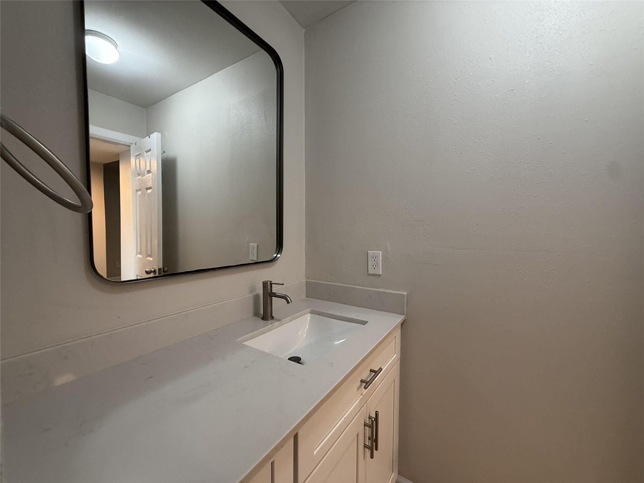 1824 Thonig Road, Unit 10 Houston, TX 77055 - Photo 16 of 17 a bathroom with a sink and a mirror