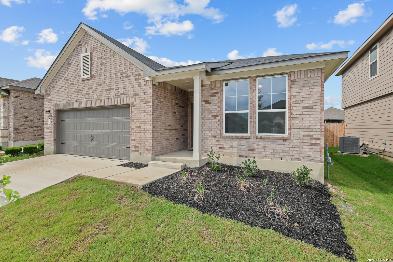 7432 Cremorne Converse, TX 78109 - Photo 2 of 35 a front view of a house with garden