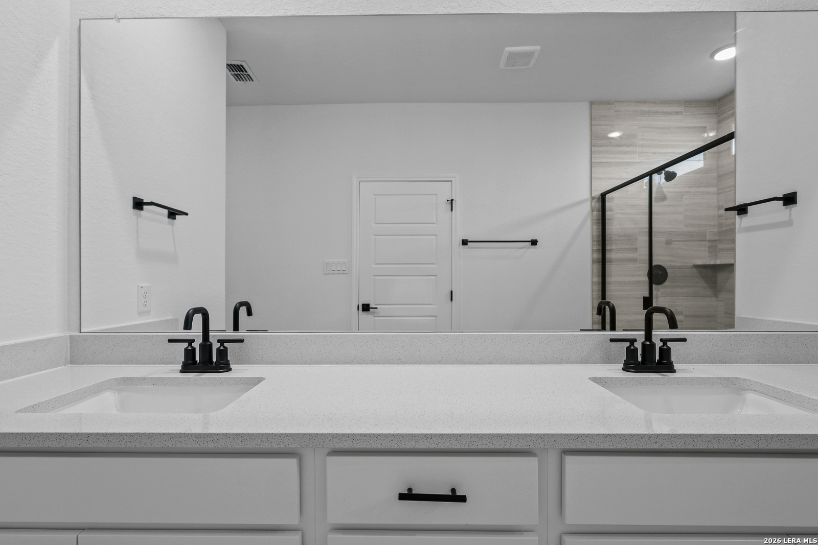 7432 Cremorne Converse, TX 78109 - Photo 22 of 35 a bathroom with a sink and a mirror