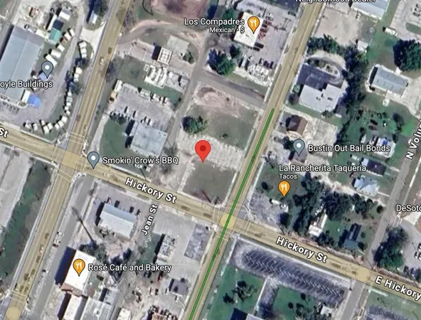 a swimming pool with outdoor seating and yard