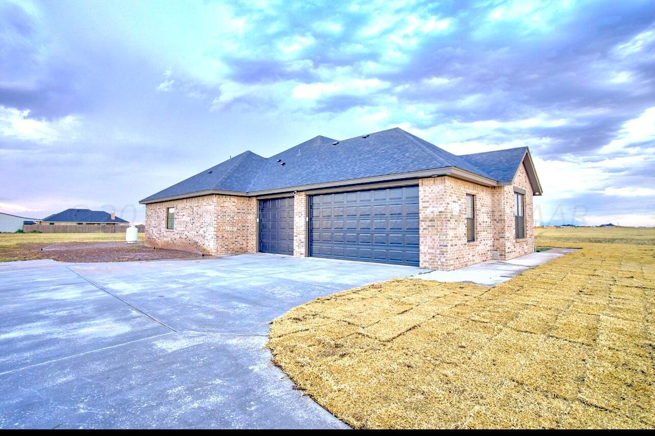 4100 Wildcat Springs Road Amarillo, TX 79119 - Photo 34 of 38 Front / Garage Side