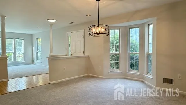 a view of a room with windows