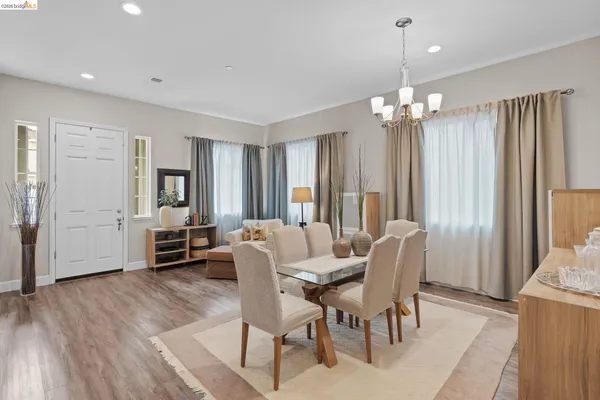 a view of a livingroom with furniture and window