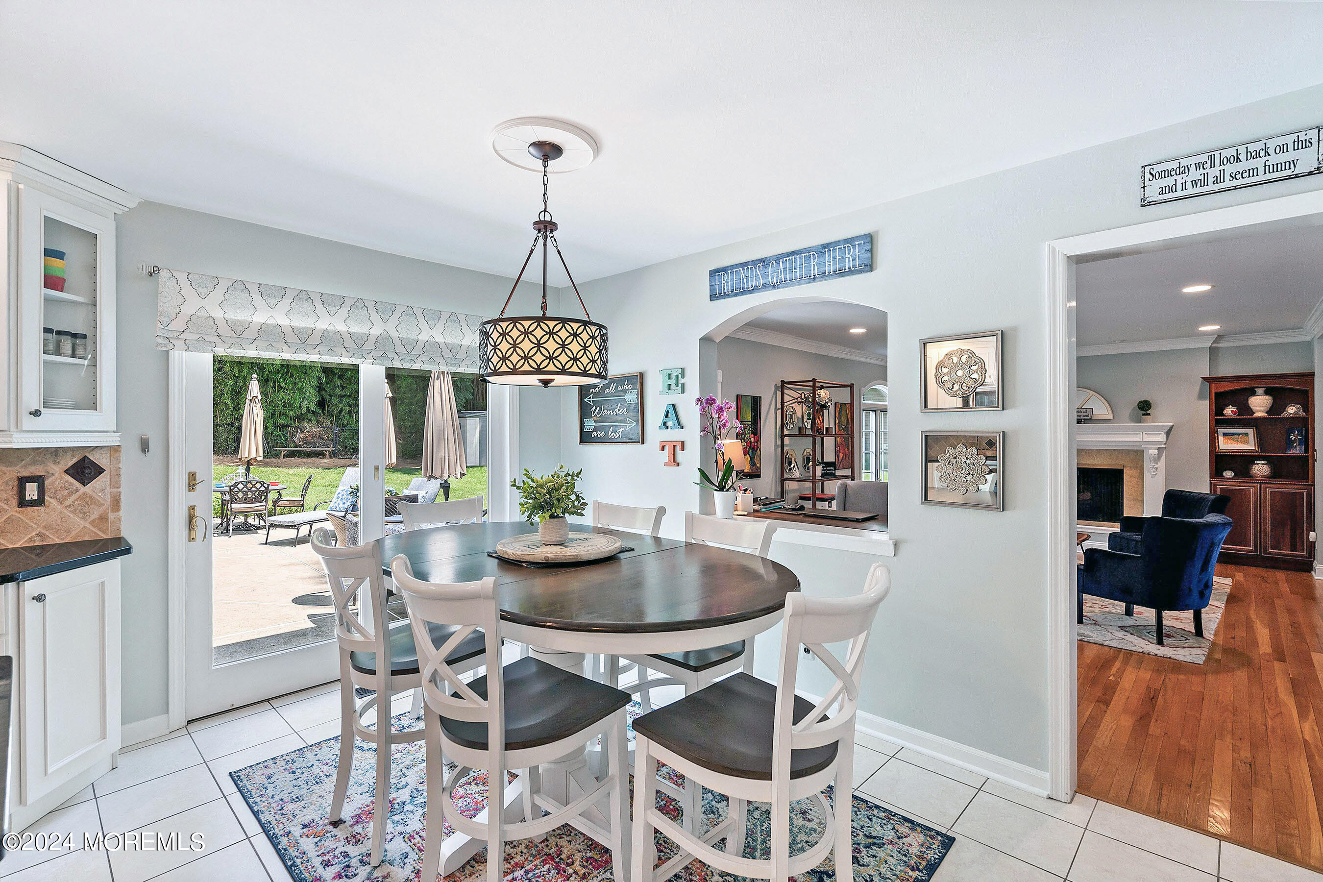 9 Doherty Drive Middletown, NJ 07748 - Photo 13 of 59 a view of a dining room with furniture wooden floor and chandelier