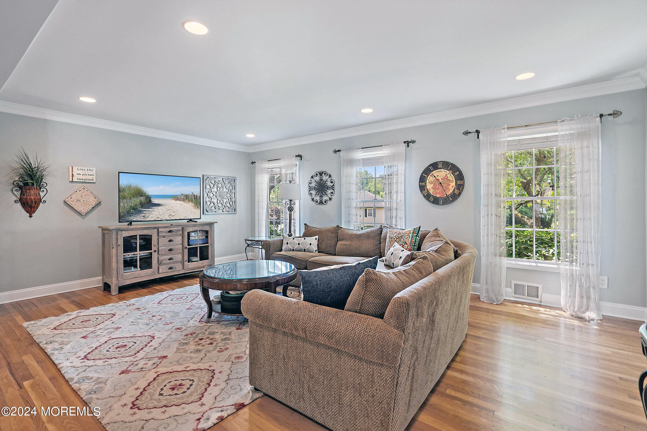9 Doherty Drive Middletown, NJ 07748 - Photo 18 of 59 a living room with furniture and a window
