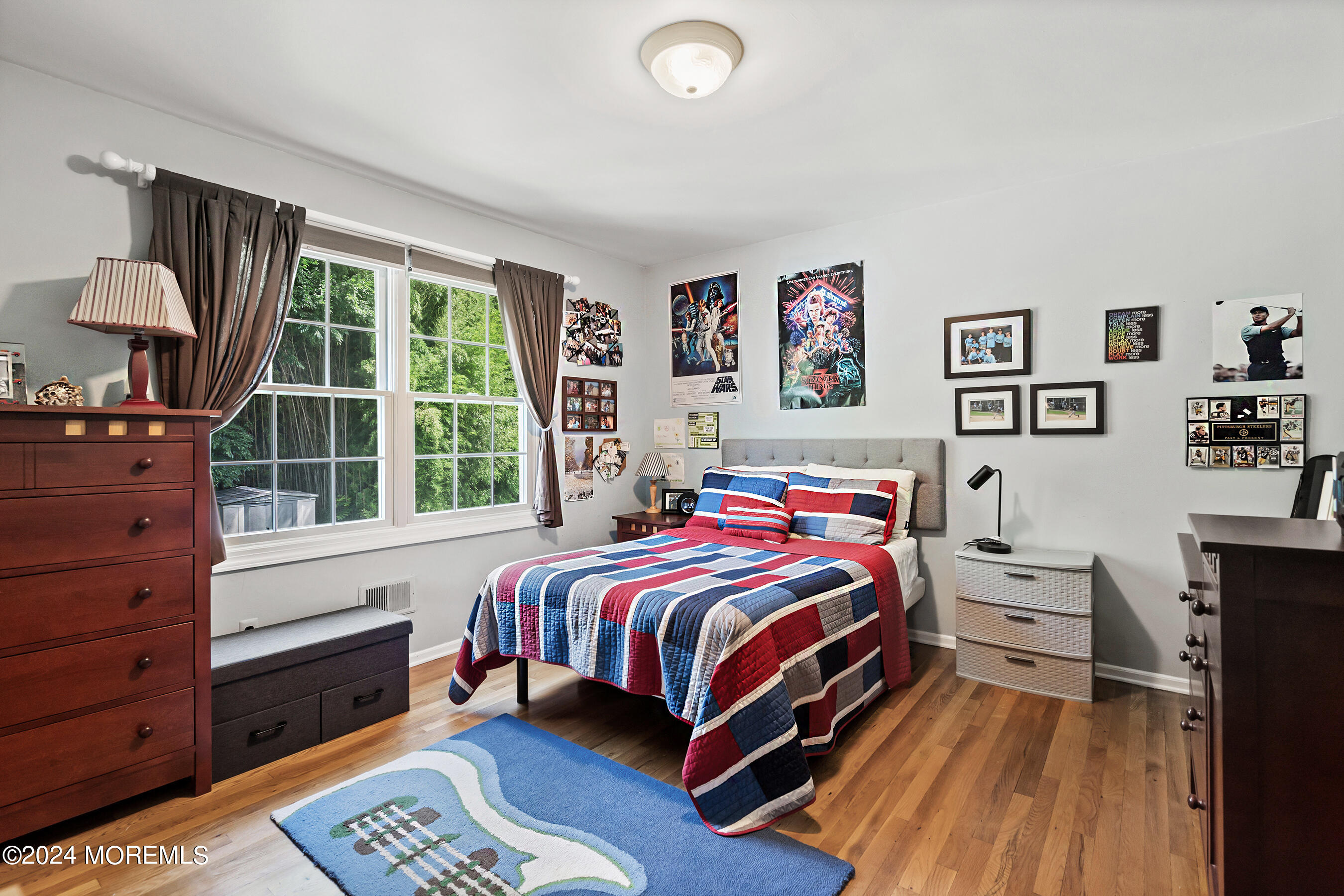 9 Doherty Drive Middletown, NJ 07748 - Photo 28 of 59 a bedroom with a bed and a dresser next to a window
