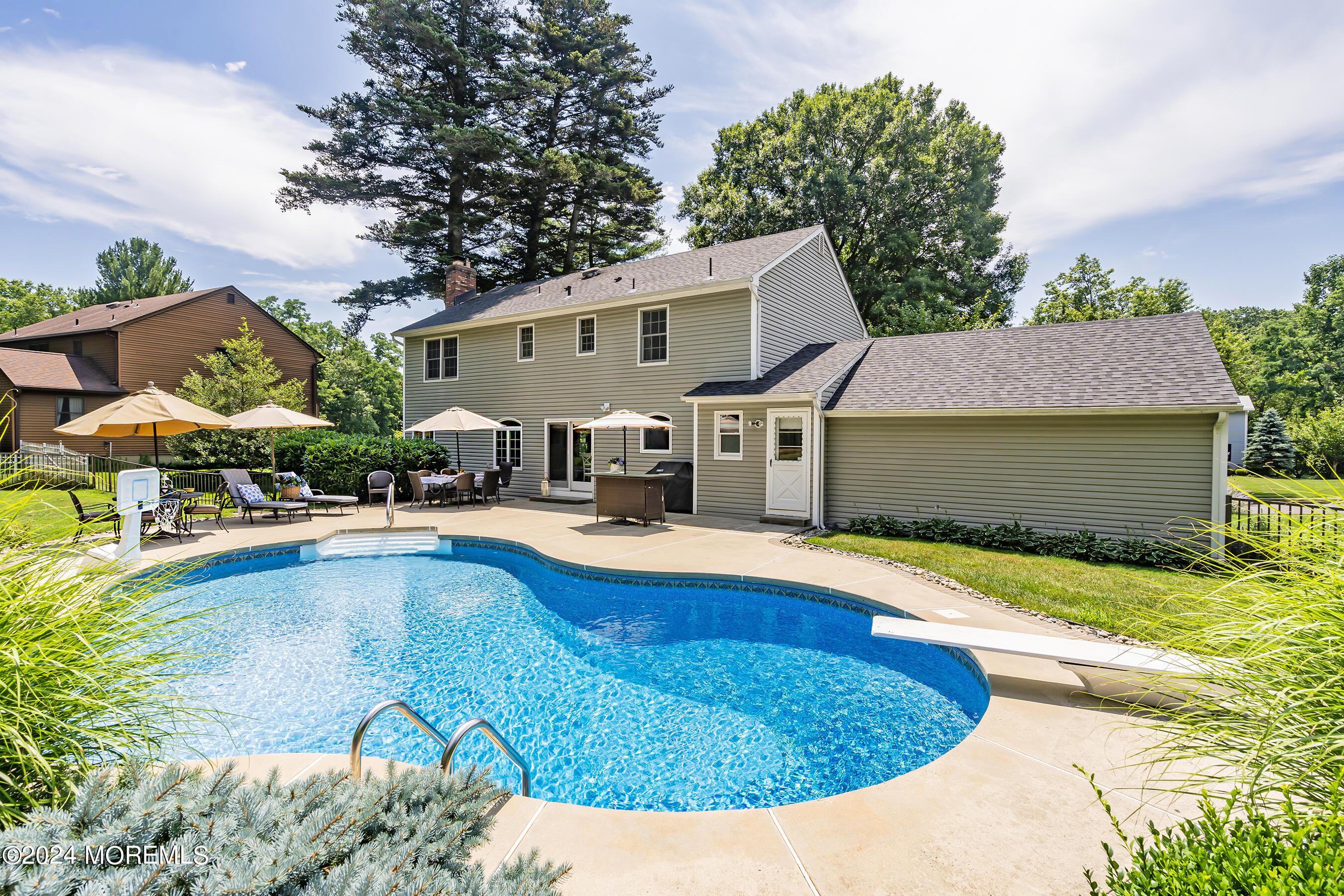 9 Doherty Drive Middletown, NJ 07748 - Photo 38 of 59 a view of a house with swimming pool