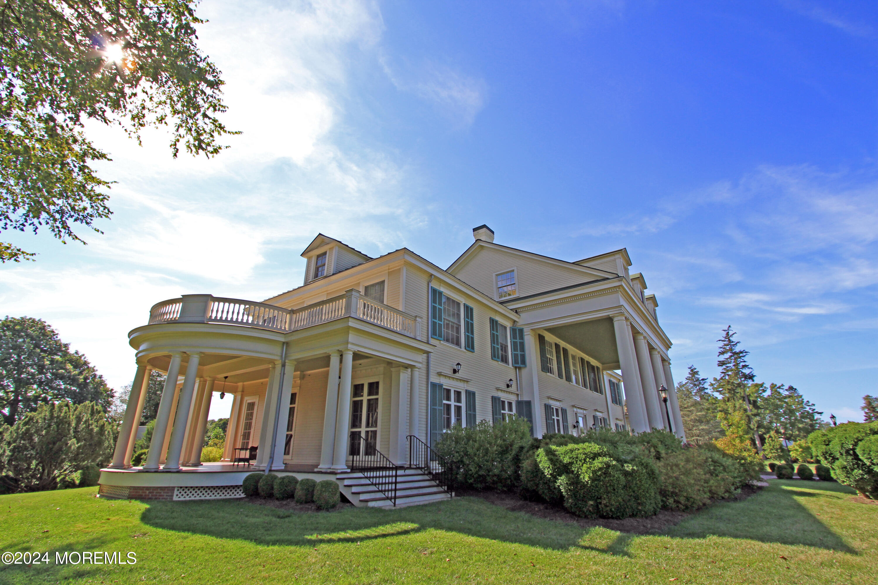 9 Doherty Drive Middletown, NJ 07748 - Photo 43 of 59 a front view of a house with yard and green space
