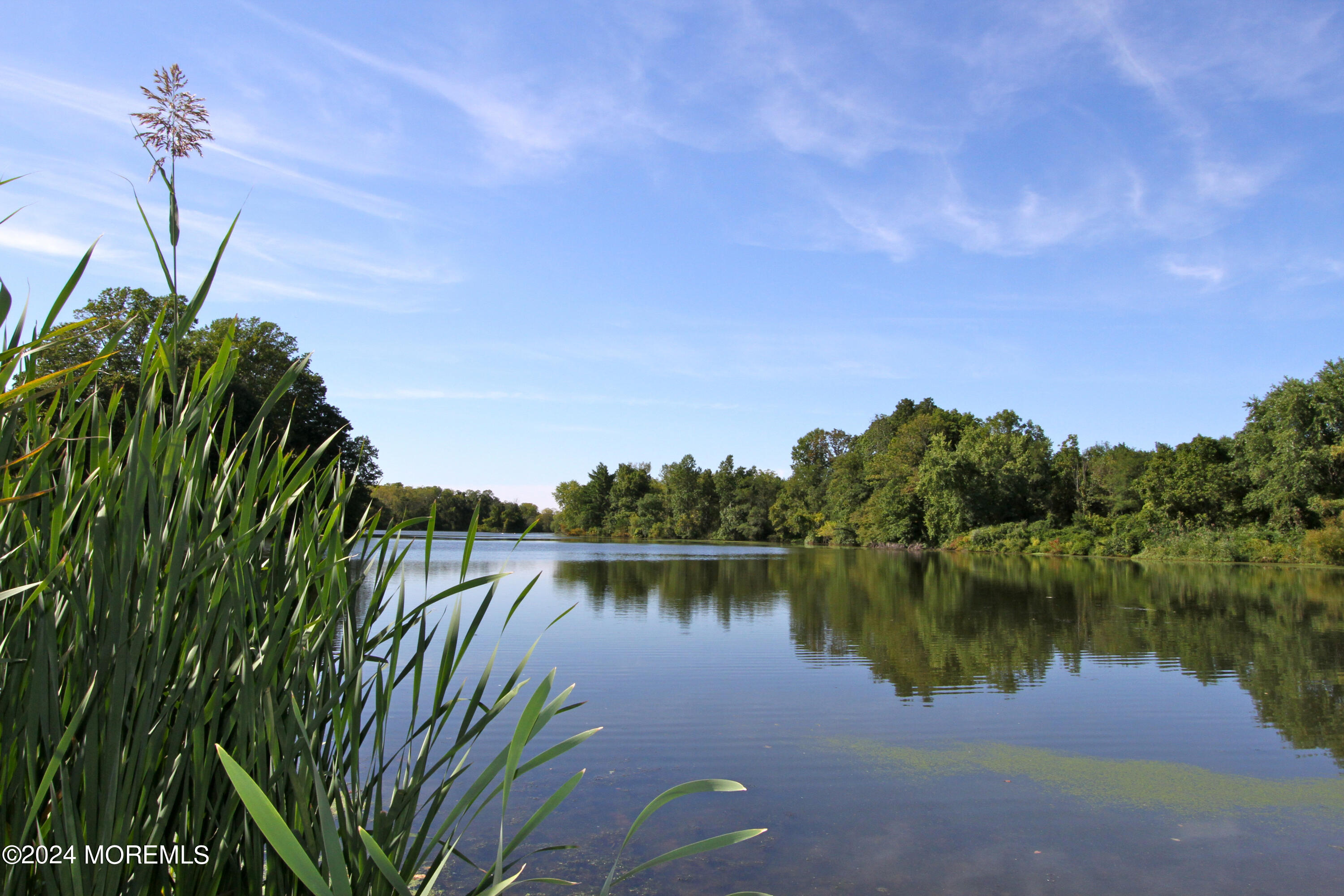 9 Doherty Drive Middletown, NJ 07748 - Photo 44 of 59 a view of a lake with a mountain view