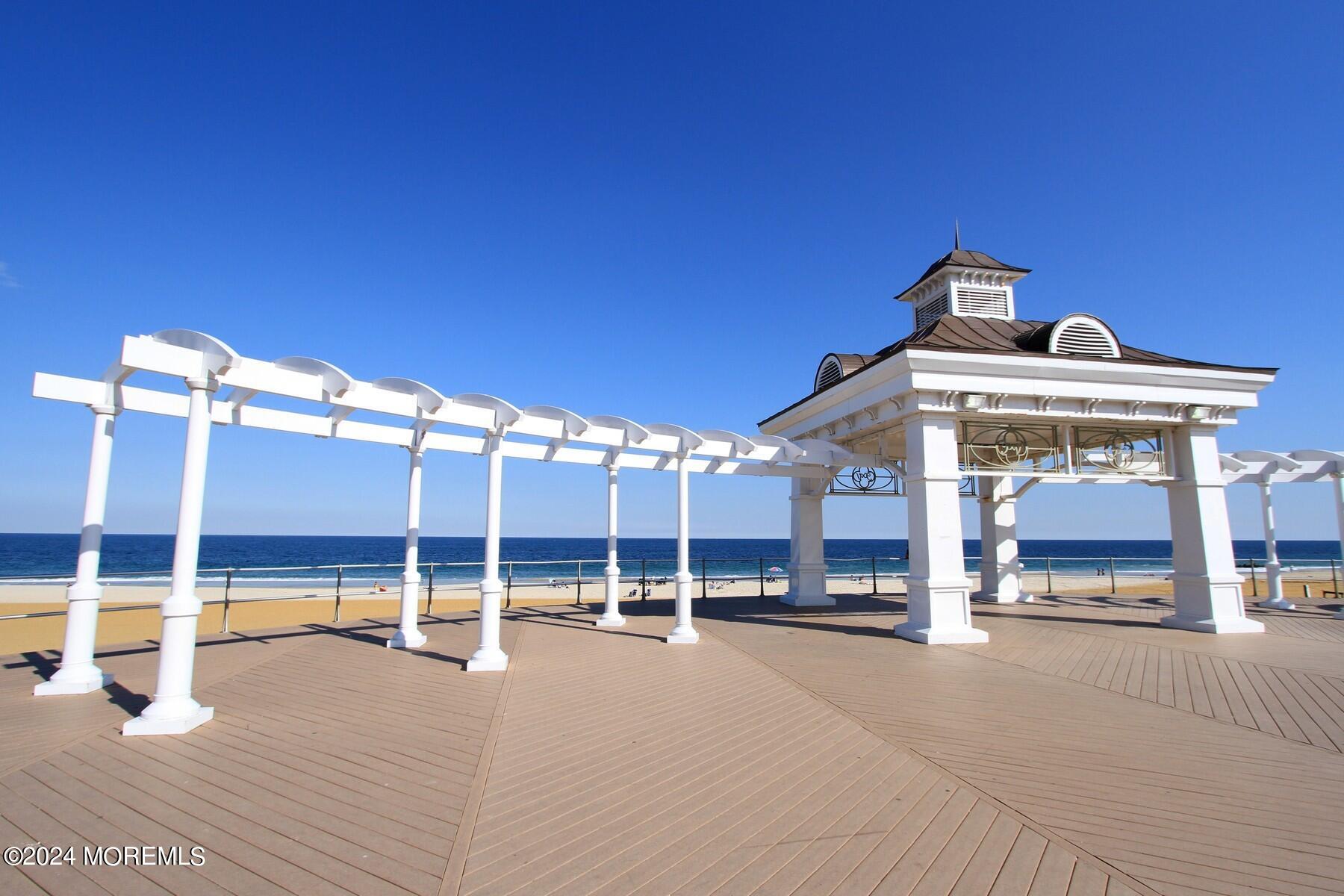 9 Doherty Drive Middletown, NJ 07748 - Photo 51 of 59 a view of a building with floor to ceiling windows