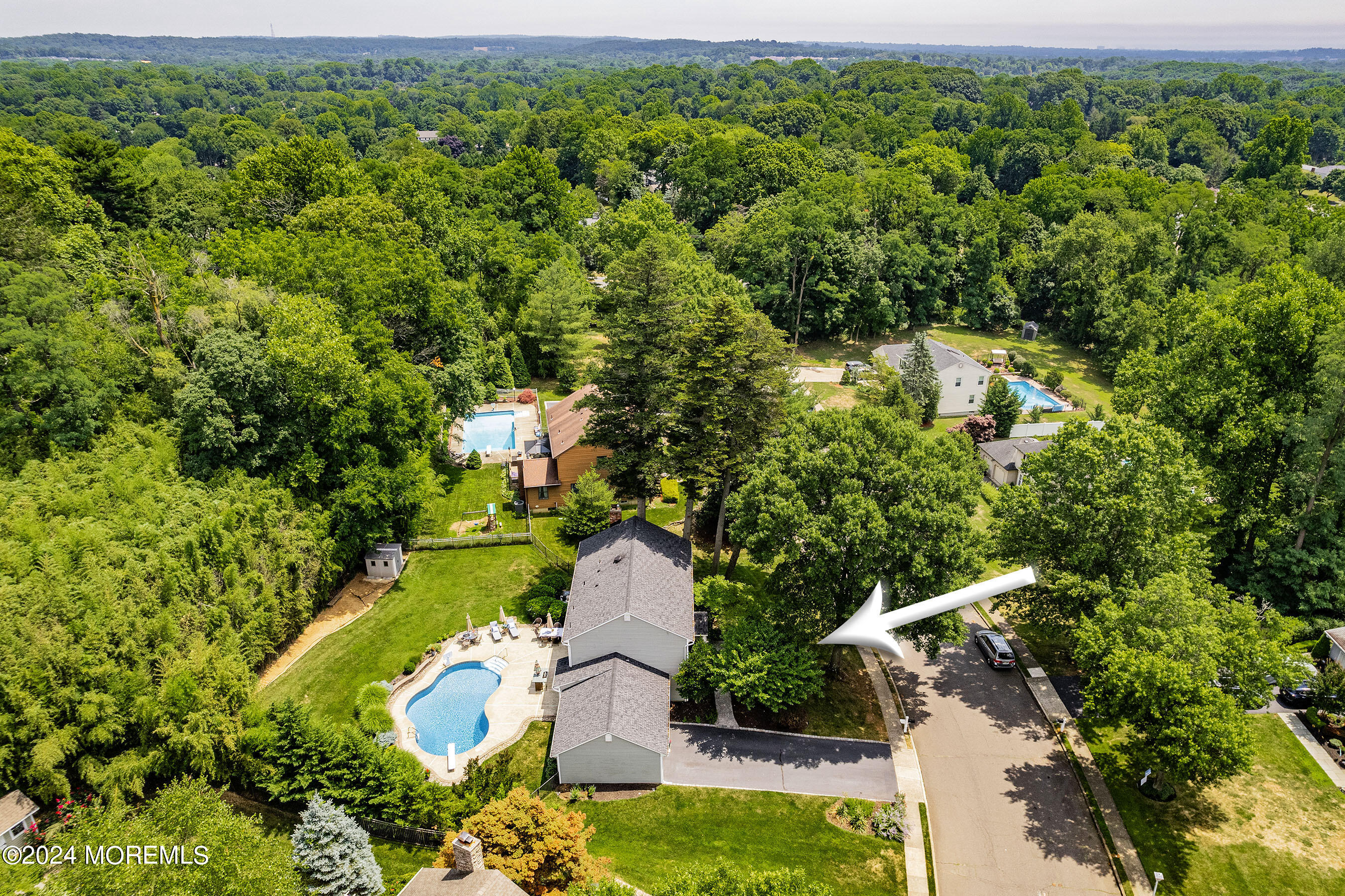 9 Doherty Drive Middletown, NJ 07748 - Photo 6 of 59 an aerial view of residential houses with outdoor space and trees all around
