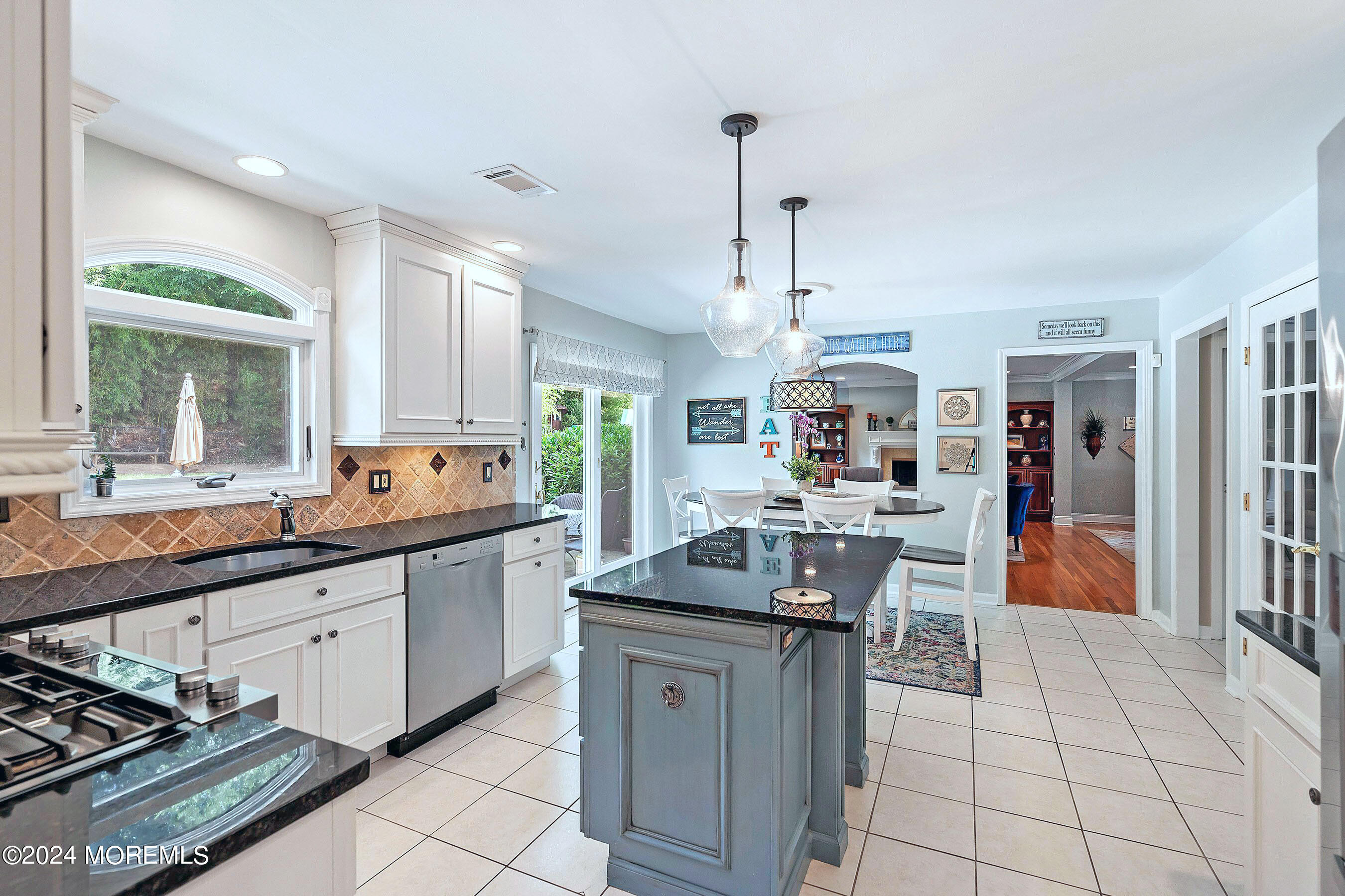 9 Doherty Drive Middletown, NJ 07748 - Photo 9 of 59 a kitchen with stainless steel appliances a sink stove and cabinets