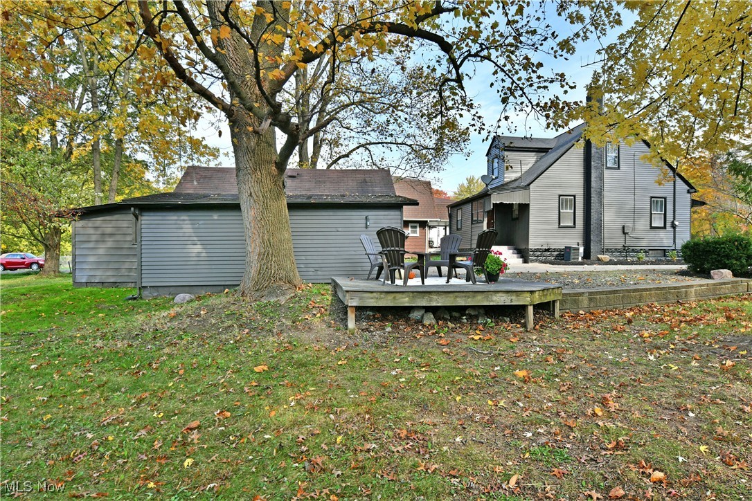 572 Howland Wilson Road Southeast Warren, OH 44484 - Photo 47 of 50 Back of property featuring a lawn