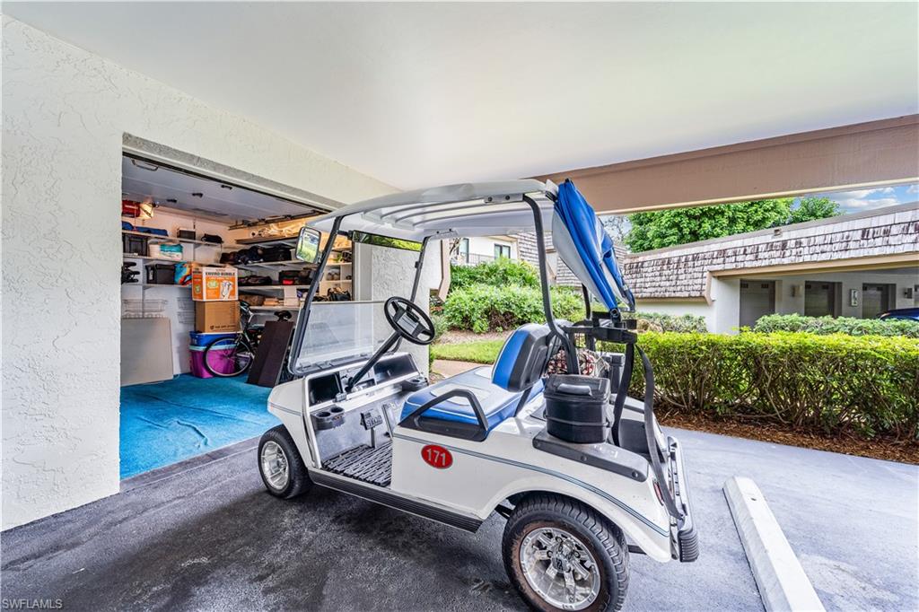 107 Clubhouse Drive, Unit 258 Naples, FL 34105 - Photo 23 of 34 Golf Cart Garage