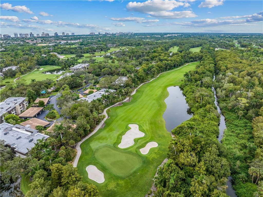 107 Clubhouse Drive, Unit 258 Naples, FL 34105 - Photo 24 of 34 View of 107 Clubhouse drive and #2 hole at Wilderness