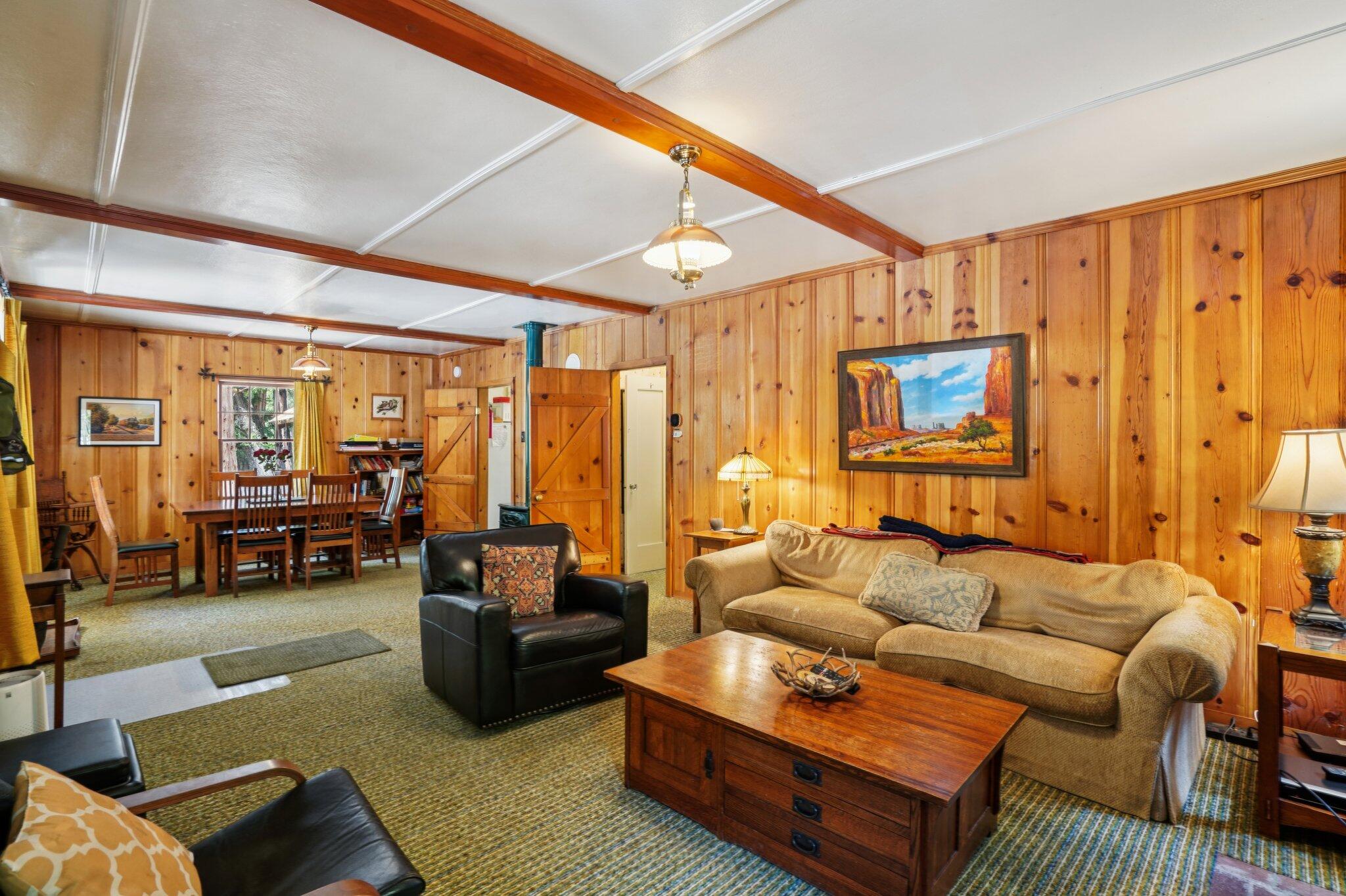 55280 Circle Way Idyllwild, CA 92549 - Photo 6 of 27 a living room with furniture ceiling fan and a rug