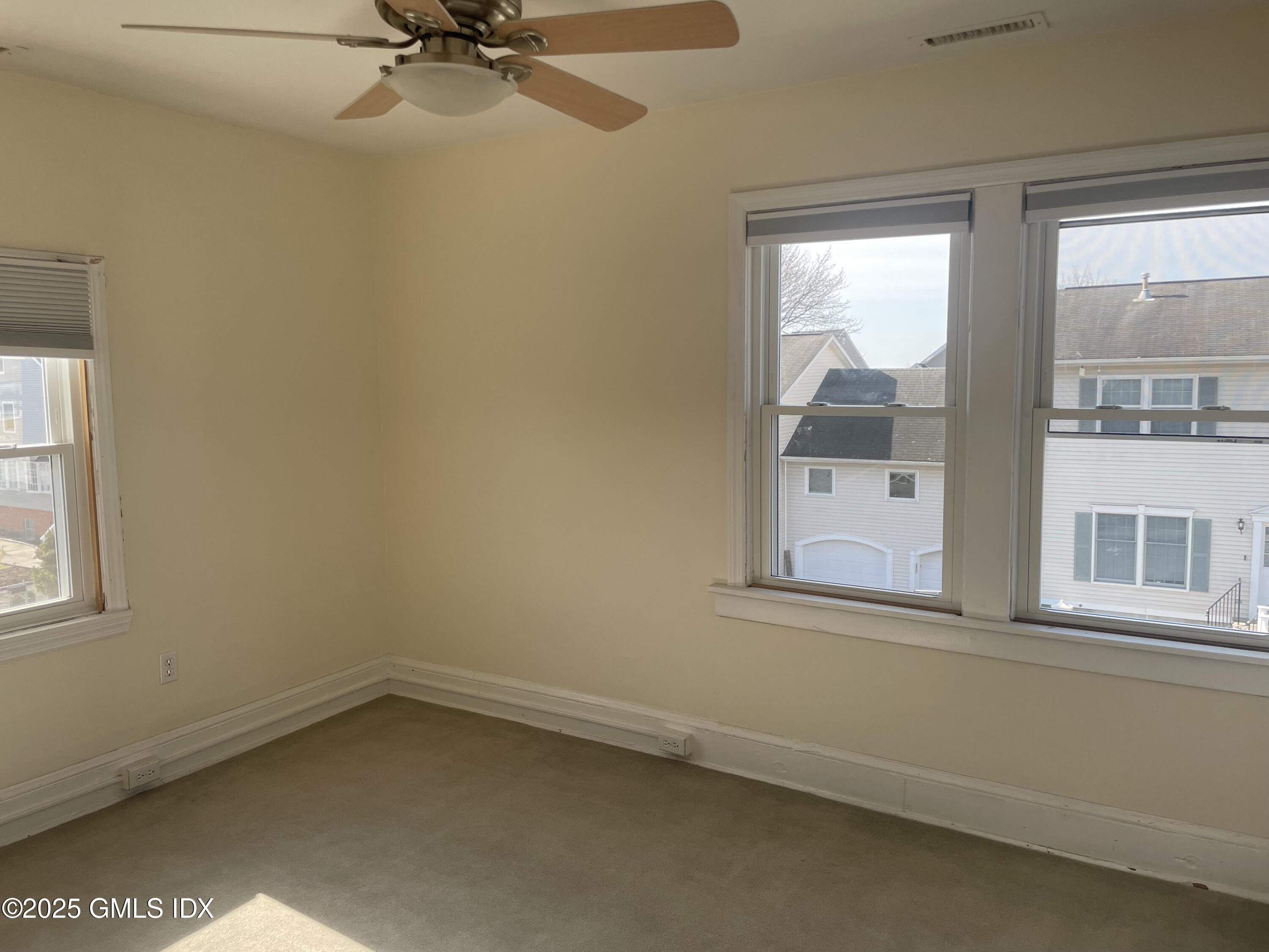 237 Hamilton Avenue, Unit 2 Greenwich, CT 06830 - Photo 12 of 20 an empty room with a window