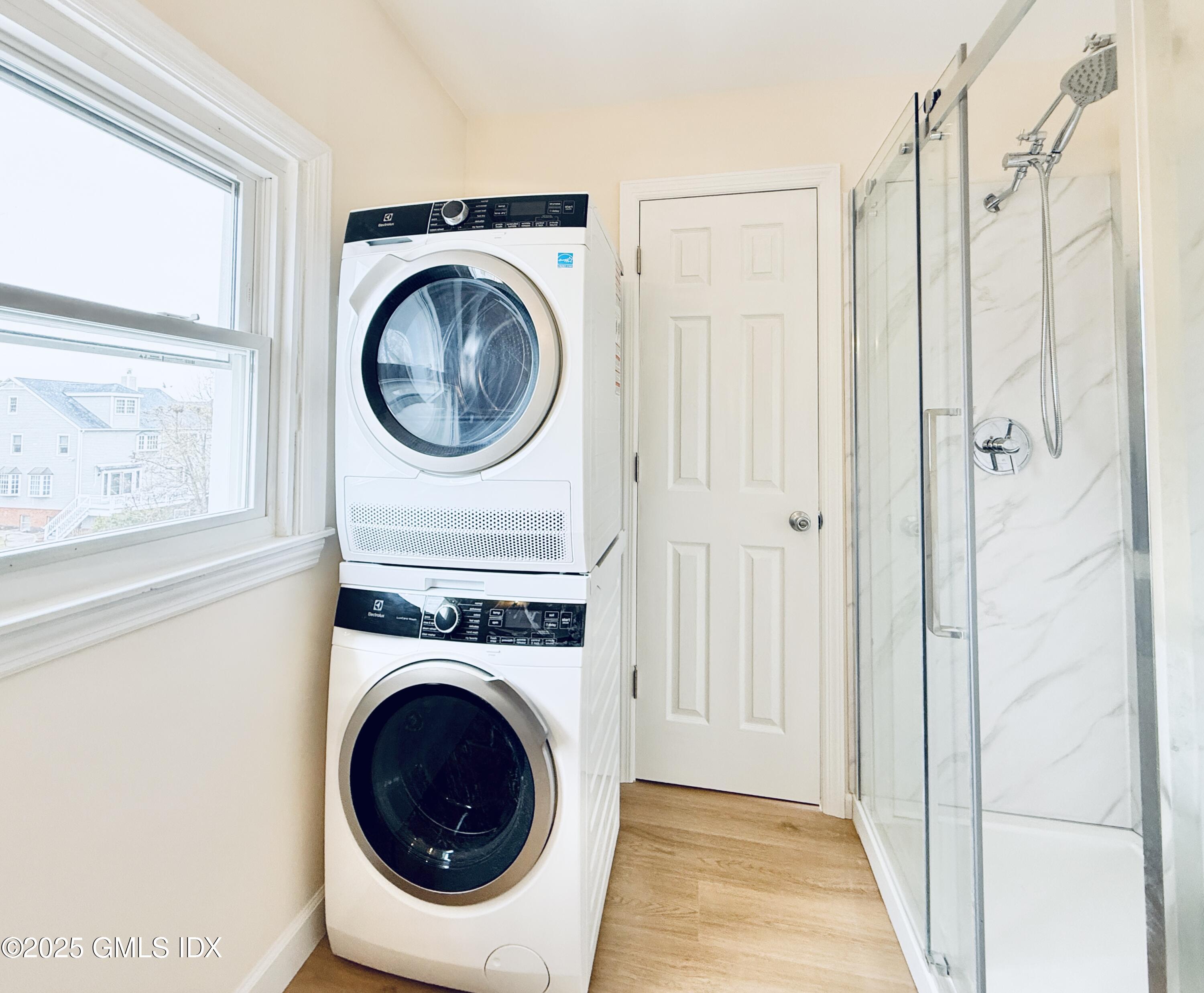 237 Hamilton Avenue, Unit 2 Greenwich, CT 06830 - Photo 15 of 20 a view of a hallway with washer and dryer