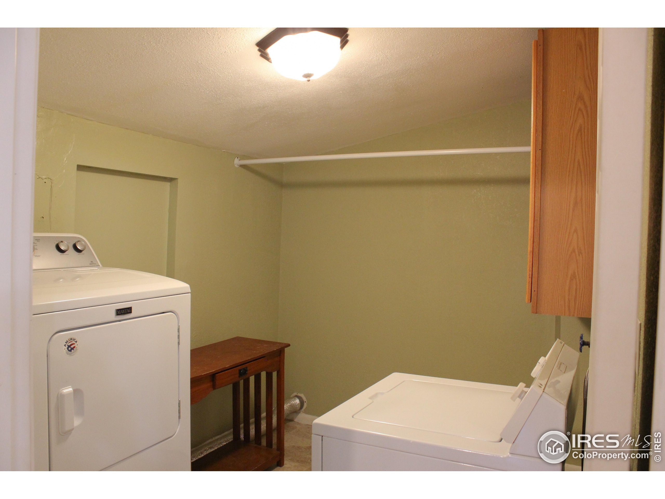 504 12th Street Greeley, CO 80631 - Photo 17 of 19 a bathroom with a sink and toilet