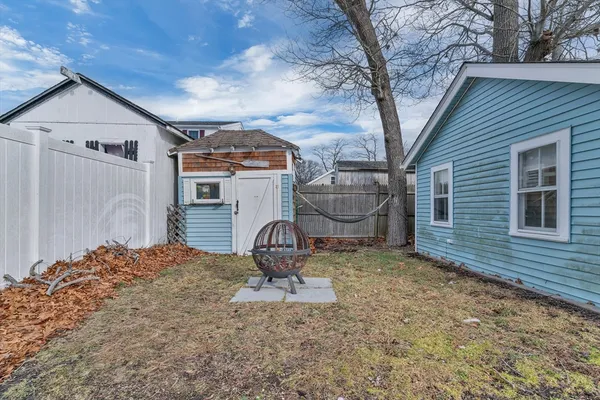 a house view with a backyard space