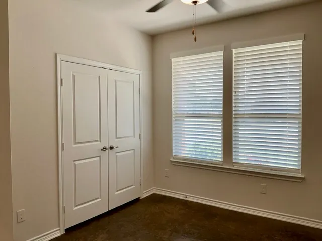 a view of a room that has a window in it