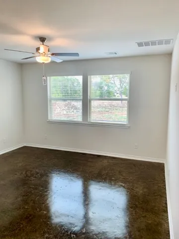 a view of a windows and chandelier in a room