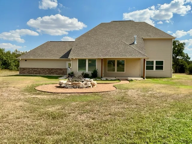 a front view of house with yard