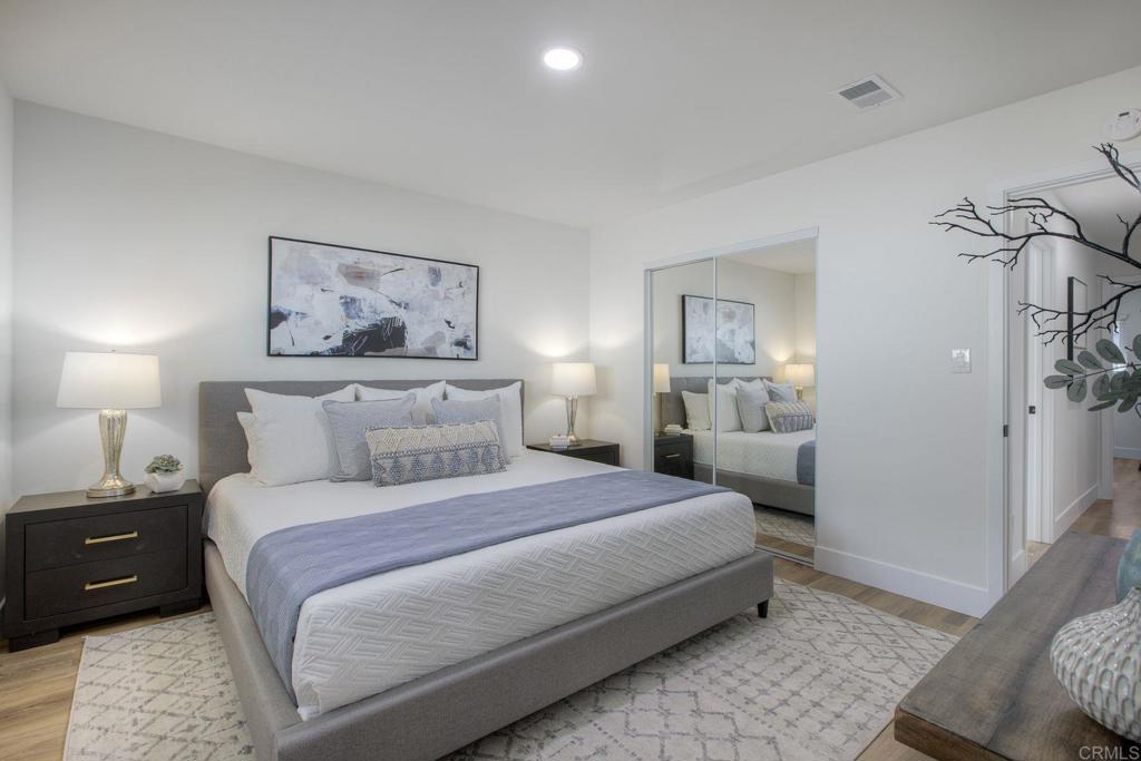 728 Hackberry Place Fallbrook, CA 92028 - Photo 14 of 23 a bedroom with a bed and a night stand