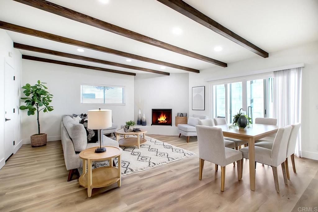 728 Hackberry Place Fallbrook, CA 92028 - Photo 9 of 23 a living room with furniture and a fireplace