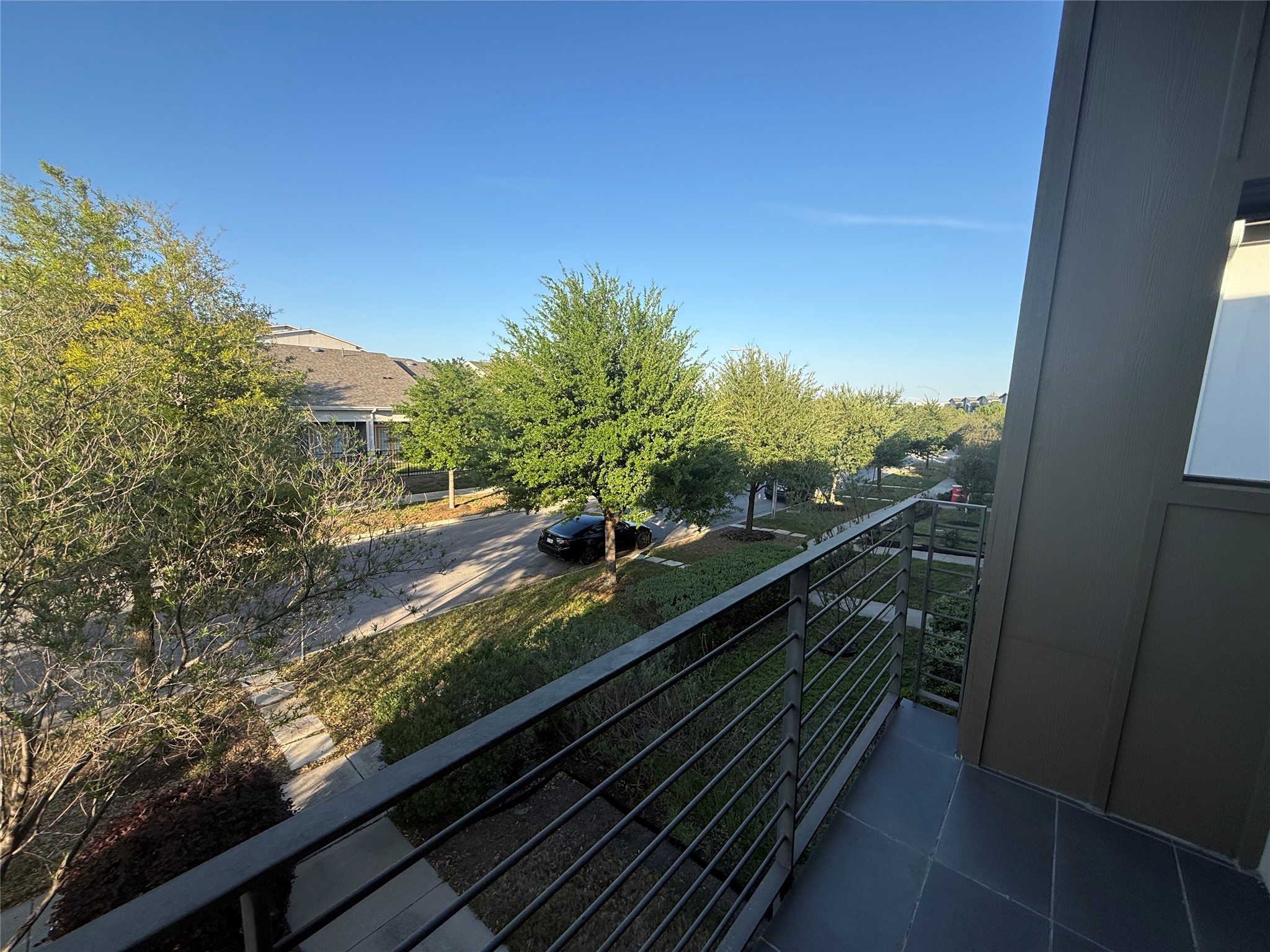 5801 Charles Merle Dr., Unit A Austin, TX 78747 - Photo 12 of 22 View from balcony which is connected to primary bedroom.