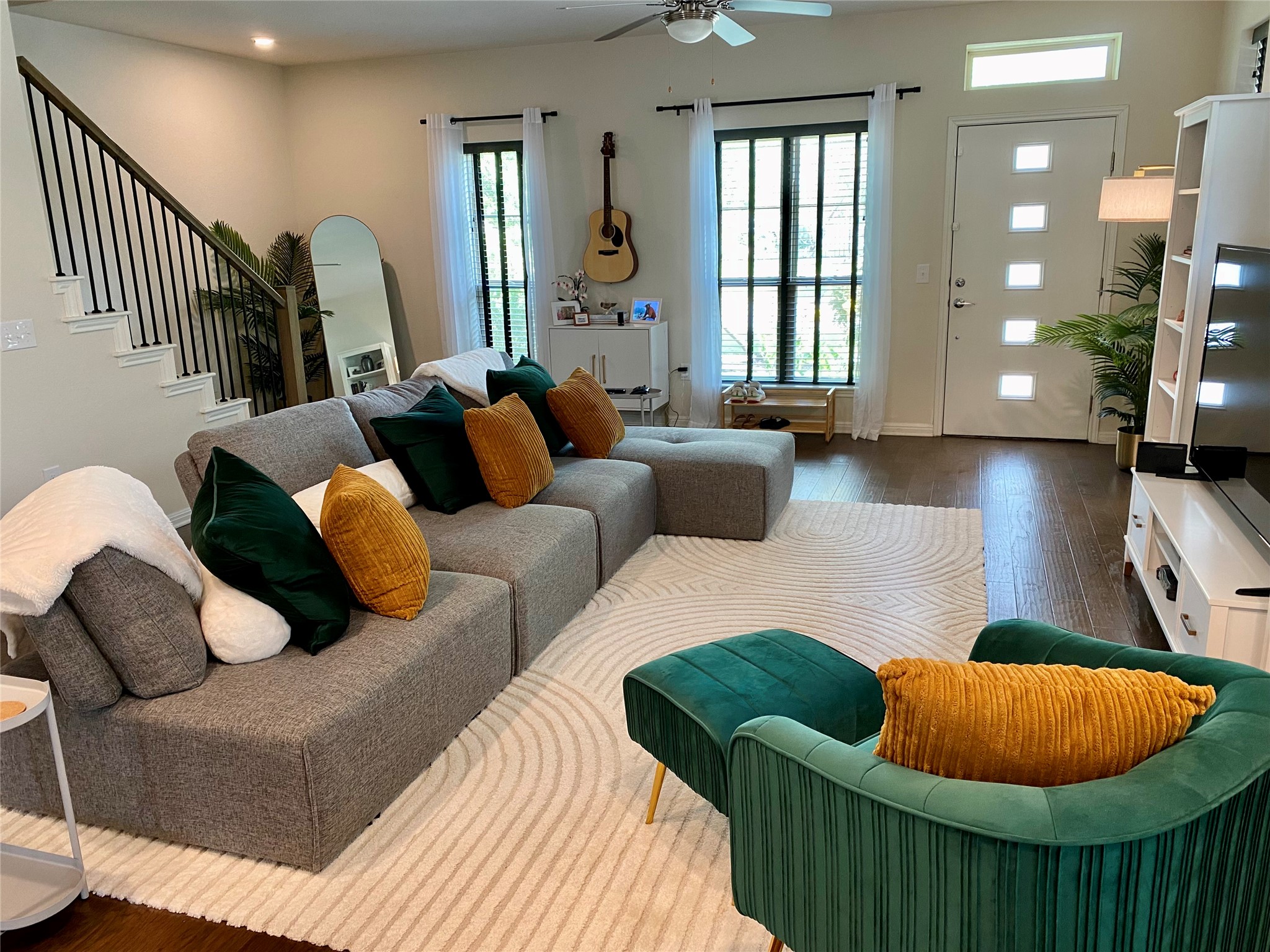 5801 Charles Merle Dr., Unit A Austin, TX 78747 - Photo 3 of 22 Open living space featuring dark wood-look tile floors Previously occupied by tenant.