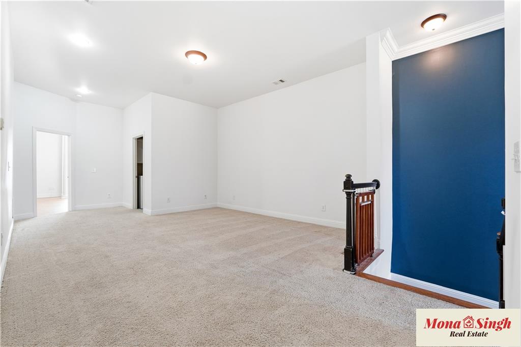 6961 Fellowship Lane Flowery Branch, GA 30542 - Photo 21 of 47 a view of an empty room