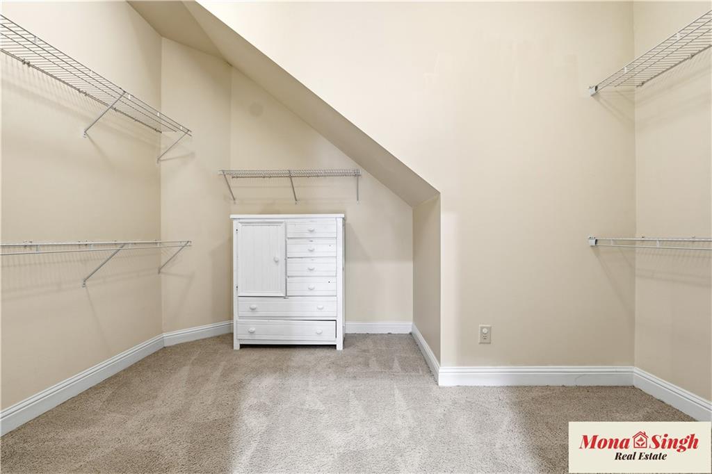 6961 Fellowship Lane Flowery Branch, GA 30542 - Photo 28 of 47 a view of closet