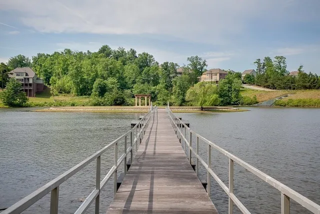 a view of a balcony with chairs