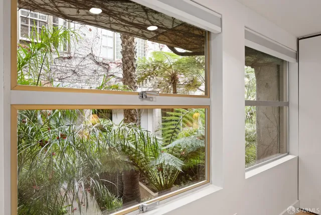 a view of a porch in a back yard