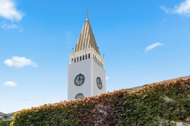 a view of a swimming pool with a yard