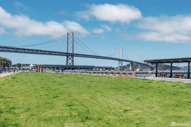 a view of a brick building with many windows