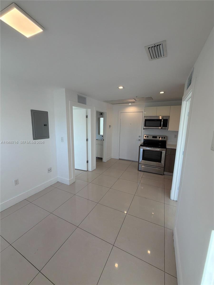 829 Southwest 18th Avenue, Unit 311 Miami, FL 33135 - Photo 4 of 11 a view of kitchen with a sink