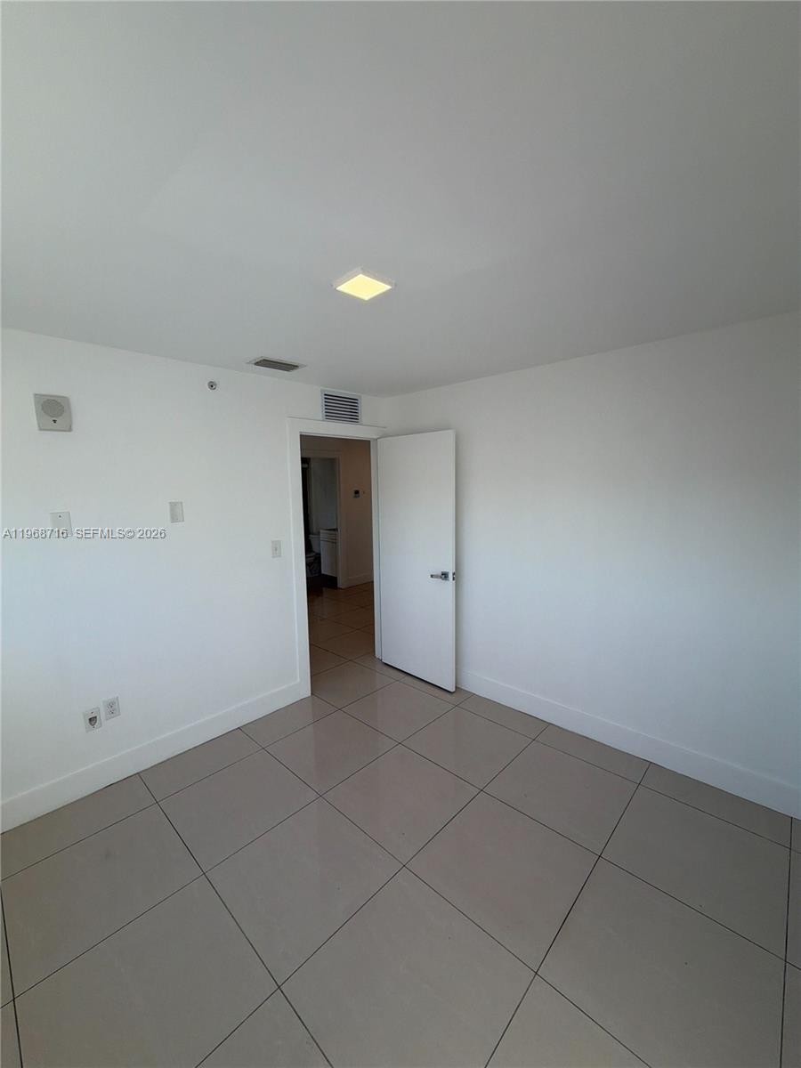 829 Southwest 18th Avenue, Unit 311 Miami, FL 33135 - Photo 9 of 11 a view of an empty room