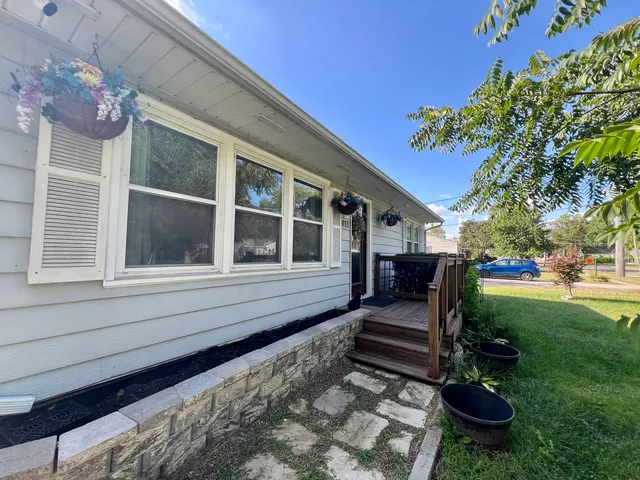 a house view with a garden space