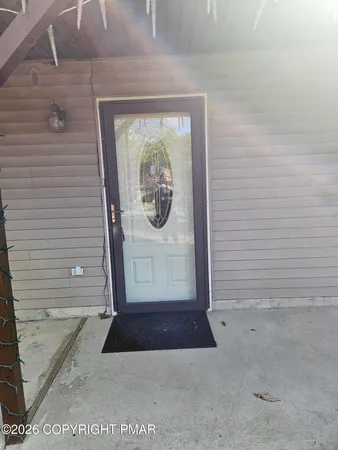 a view of a door front of a house