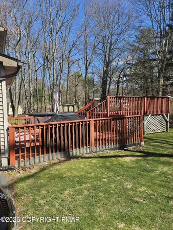 a view of a deck with a trees