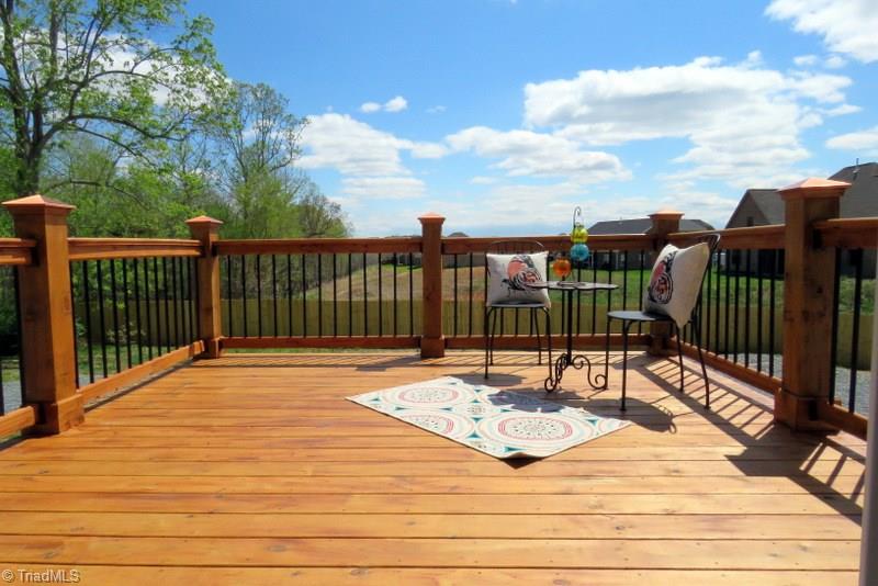 8529 Lasater Road Clemmons, NC 27012 - Photo 29 of 30 Great deck for entertaining on or just relaxing and catching some sun.