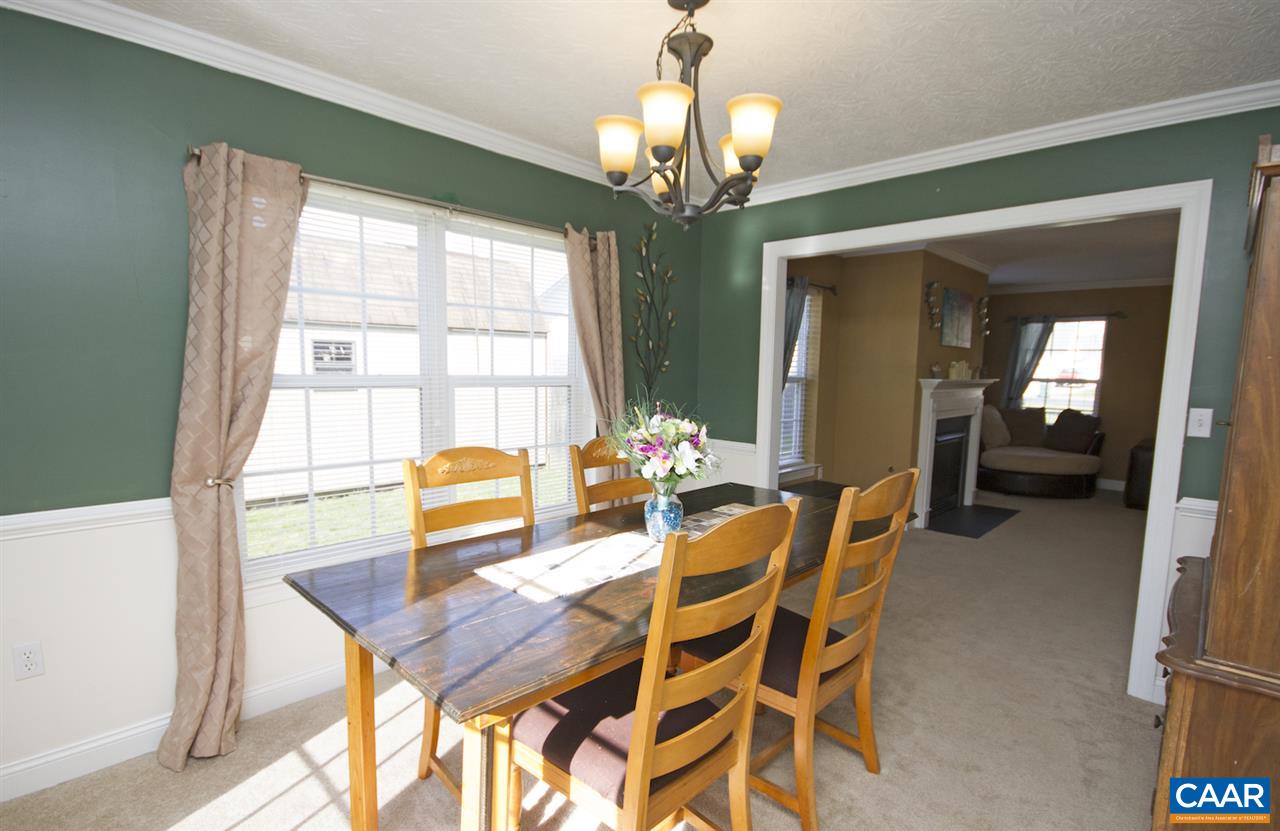 216 Inglecress Road Waynesboro, VA 22980 - Photo 13 of 28 a view of a dining room with furniture and a chandelier
