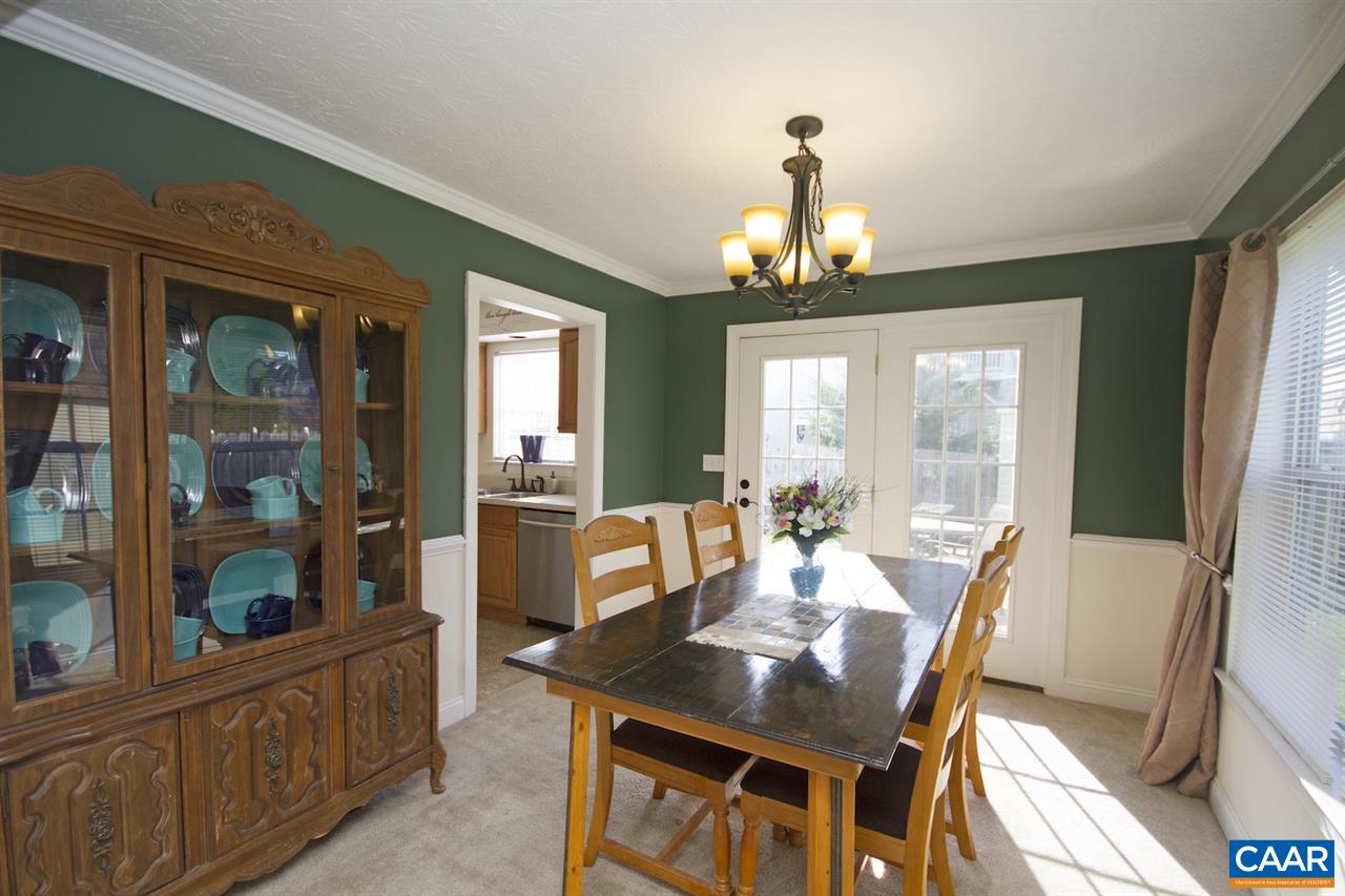 216 Inglecress Road Waynesboro, VA 22980 - Photo 14 of 28 a view of a dining room with furniture wooden floor and a chandelier